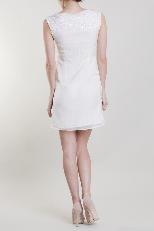 Vestido blanco pailltes modelo espalda